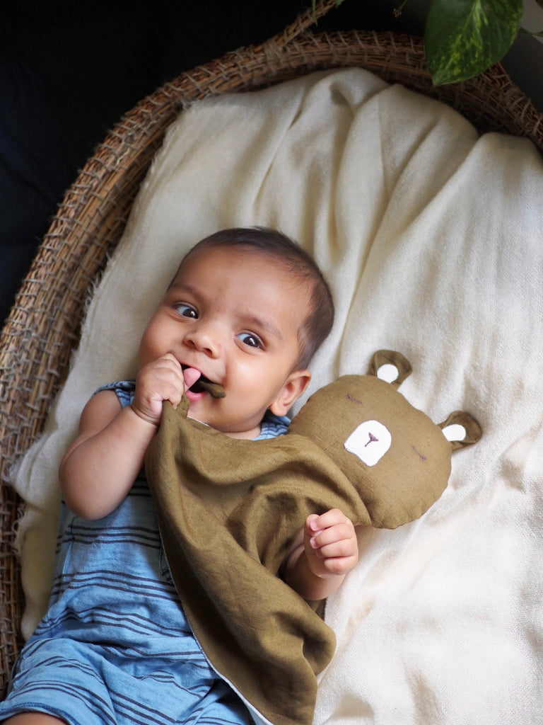 happy baby with little koko olive bear comforter