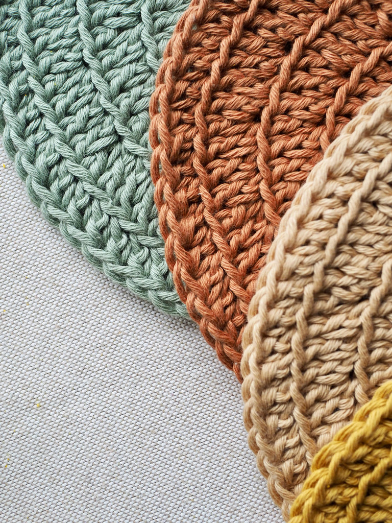 four crochet 100% organic cotton little koko wash cloths made with organic cotton