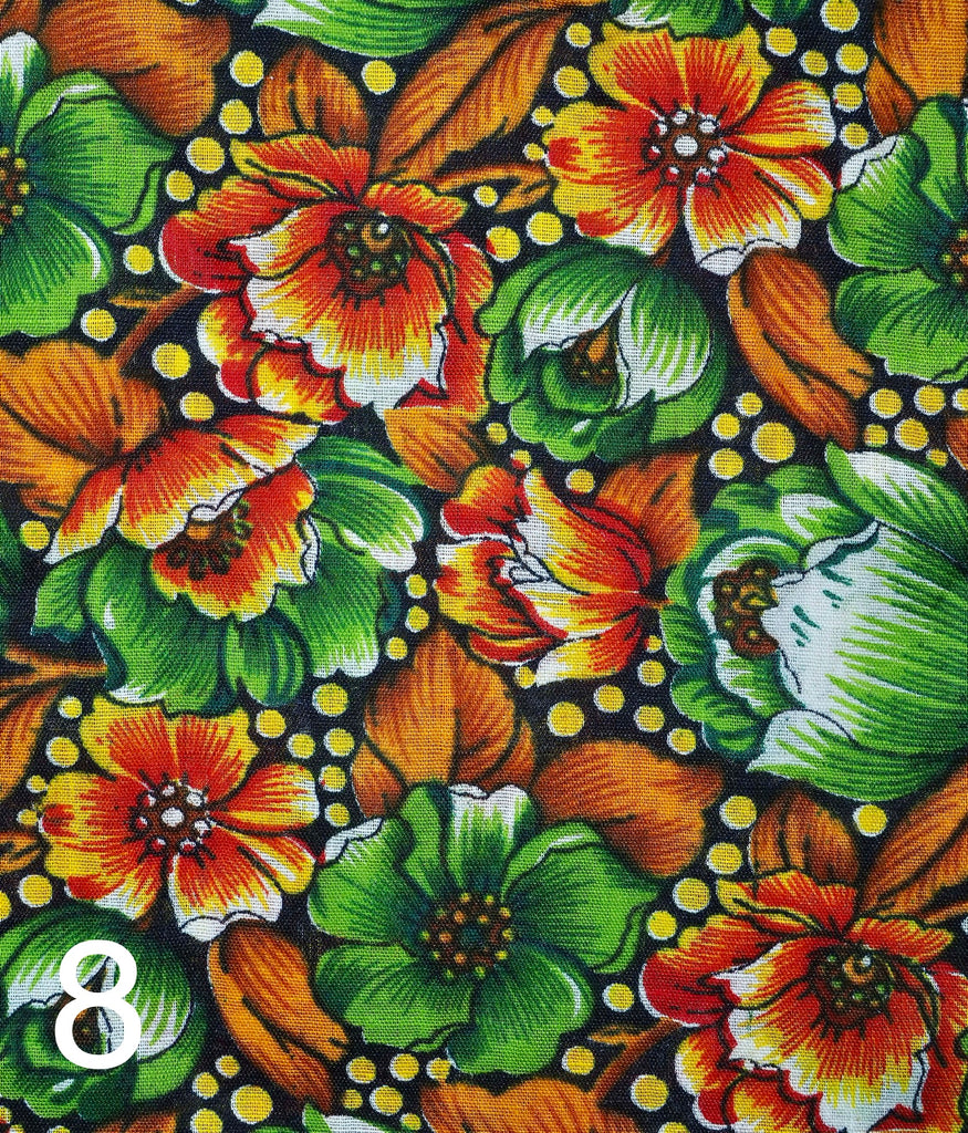 orange and green flowers on black fabric for little koko not-for-profit gift bags